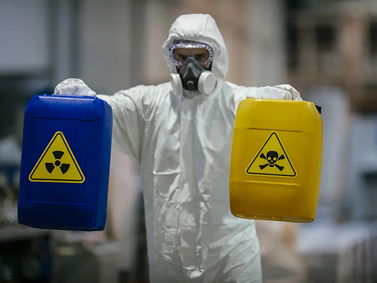 Biohazard cleanup technicians in protective equipment at a remediation scene in Wentzville, MO